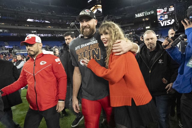 Kansas City Chiefs tight end Travis Kelce and Taylor Swift walk together after an AFC Championship NFL football game between the Chiefs and the Baltimore Ravens, Jan. 28, 2024, in Baltimore.