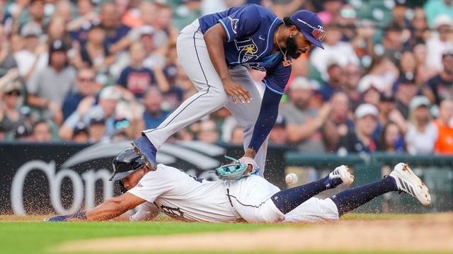 The Detroit Tigers’ Wenceel Perez slides in  safely at third base as the Tampa Bay Rays’ Junior Caminero takes the throw during the fourth inning at Comerica Park on Wednesday, July 9, 2025, in Detroit. (Nic Antaya/Getty Images/TNS)