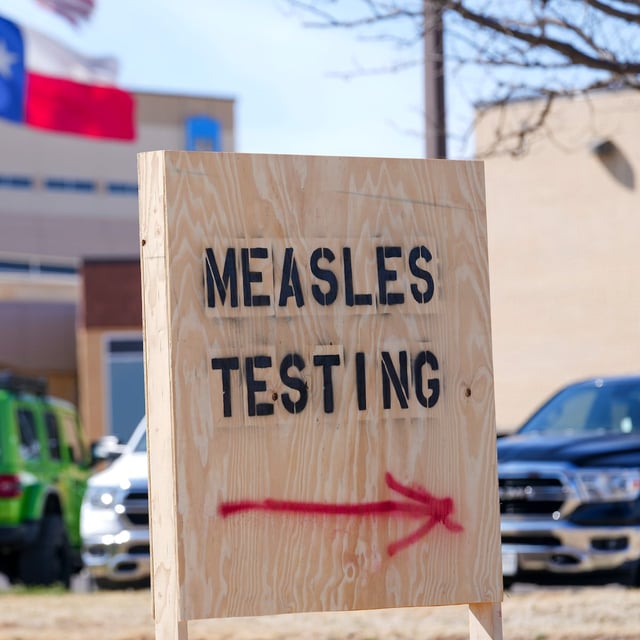 FILE - A sign is displayed outside the Seminole Hospital District offering measles testing, Feb. 21, 2025, in Seminole, Texas. (AP Photo/Julio Cortez, File)