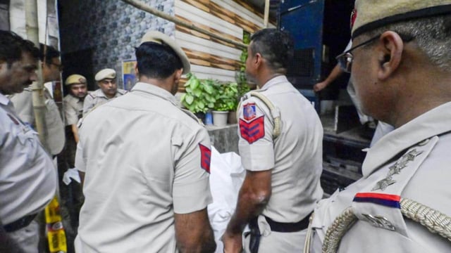 Police at the scene of crime on Tuesday. (RAJ K RAJ /HT PHOTO)