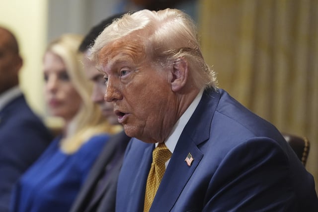 President Donald Trump, center, speaking during a cabinet meeting at the White House, Tuesday, July 8, 2025, in Washington.