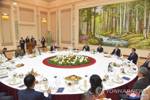 This photo, carried by North Korea's official Korean Central News Agency on July 10, 2021, shows the North's State Affairs Commission hosting a reception in Pyongyang ahead of the 60th anniversary of the signing of a mutual defense treaty between North Korea and China. (For Use Only in the Republic of Korea. No Redistribution) (Yonhap)