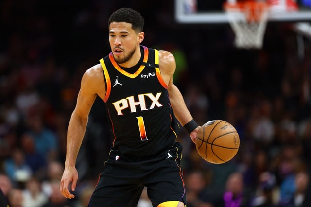 Apr 9, 2025; Phoenix, Arizona, USA; Phoenix Suns guard Devin Booker (1) dribbles the ball against the Oklahoma City Thunder during the first half at Footprint Center. Mandatory Credit: Mark J. Rebilas-Imagn Images/File Photo