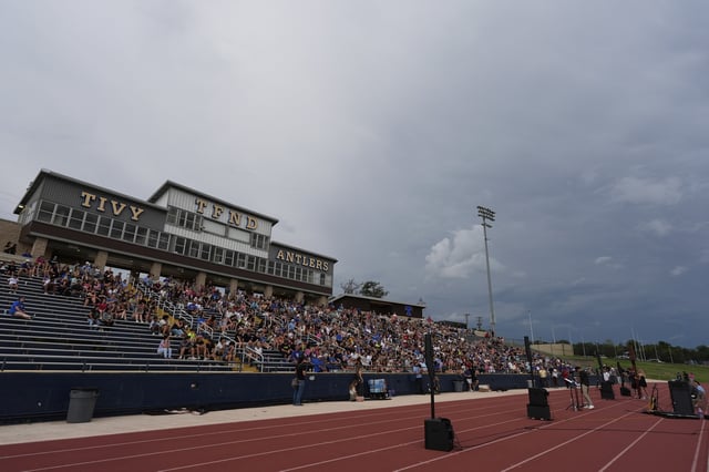 Clouds move in during a vigil for flooding victims at Tivy Antler Stadium on Wednesday, July 9, 2025, in Kerrville, Texas. (AP Photo/Ashley Landis)