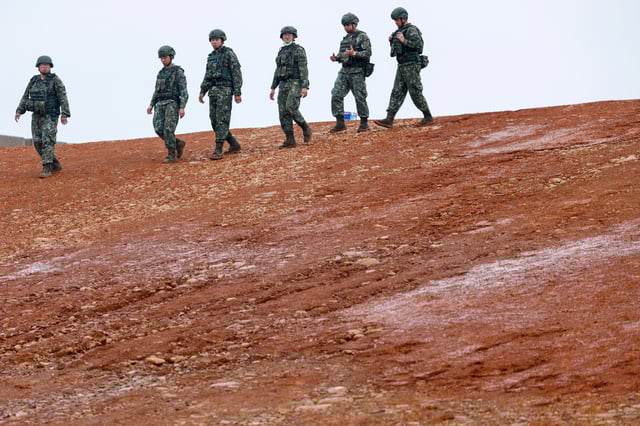 Soldiers walk at a military base in Hsinchu, Taiwan July 10, 2025. REUTERS/Ann Wang