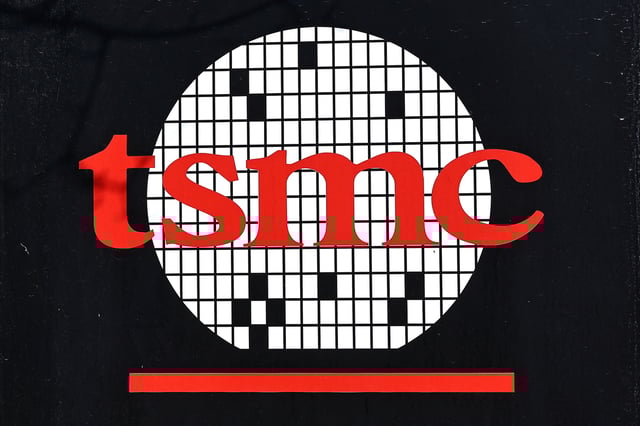 The logo of Taiwan Semiconductor Manufacturing Co (TSMC) is pictured at its headquarters, in Hsinchu, Taiwan, January 19, 2021. REUTERS/Ann Wang/File Photo