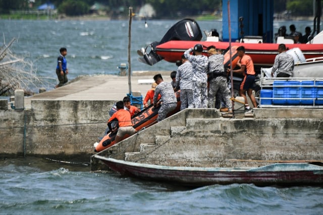 The Philippine Coast Guard took part in search operations on Lake Taal, which spans more than 230 squar kilometres (89 square miles)