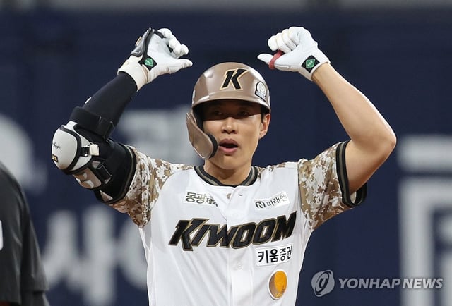 Song Sung-mun of the Kiwoom Heroes celebrates after hitting an RBI double against the Kia Tigers during a Korea Baseball Organization regular-season game at Gocheok Sky Dome in Seoul, in this file photo from June 26, 2025. (Yonhap)