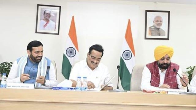 Union jal shakti minister CR Patil flanked by Haryana chief minister Nayab Singh Saini and his Punjab counterpart Bhagwant Mann during the meeting on the Sutlej-Yamuna Link Canal in New Delhi on Wednesday.