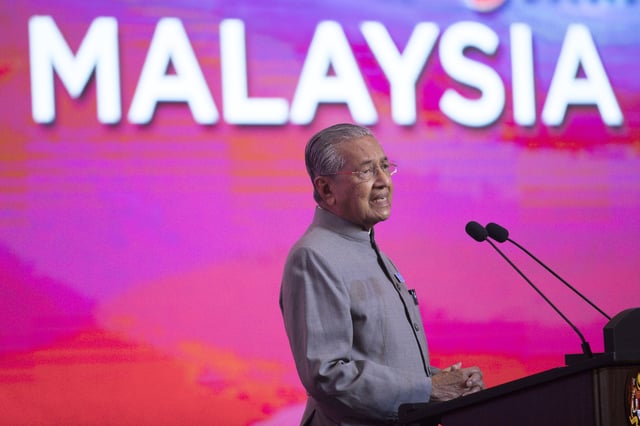 FILE - In this May 9, 2019, photo, Malaysian Prime Minister Mahathir Mohamad, speaks during a press conference in Putrajaya, Malaysia. (AP Photo/Vincent Thian, File)