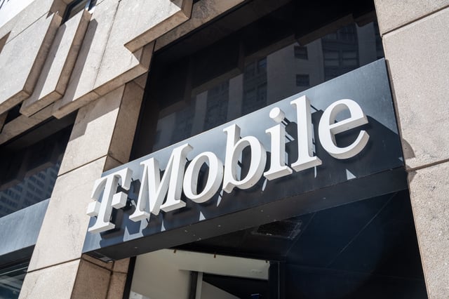 Stock photograph showing a T-Mobile store exterior with logo sign on stone facade in San Francisco, California, on May 13, 2025.