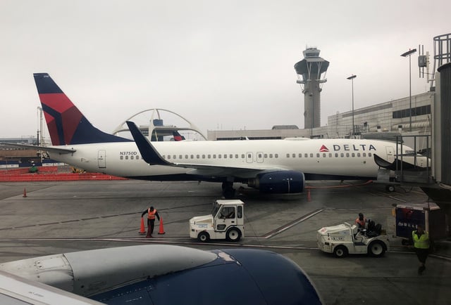 A Delta Air Lines Boeing 737-800 plane sits at the gate at LAX airport in Los Angeles, California, U.S., April 1, 2018. REUTERS/Lucy Nicholson/File Photo