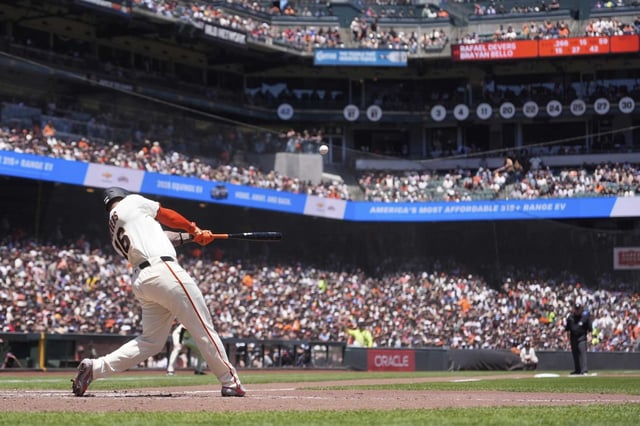 The Giants’ Rafael Devers hits a two-run home run against his former team, the Boston Red Sox, during the third inning on June 21 at Oracle Park.