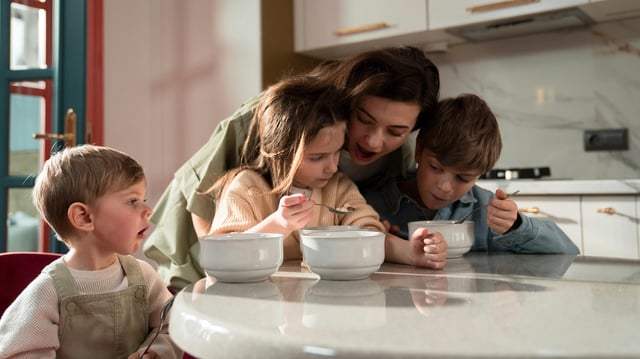 A mother and three children. Image: Pexels