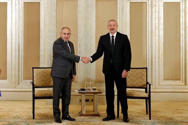 Armenian Prime Minister Nikol Pashinyan and Azerbaijani President Ilham Aliyev meet in Abu Dhabi, United Arab Emirates July 10, 2025. Press Service of Prime Minister of the Republic of Armenia/Handout via REUTERS