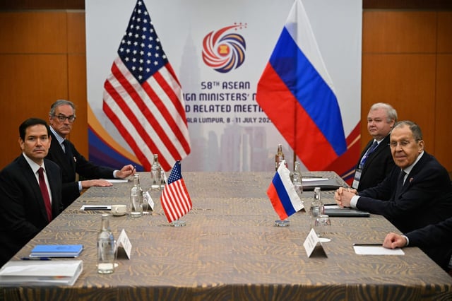 US Secretary of State Marco Rubio, left, meets with Russia's Foreign Minister Sergei Lavrov, right, on the sidelines of the ASEAN Foreign Ministers' meeting in Kuala Lumpur, Thursday, July 10, 2025. (Mandel Ngan/Pool Photo via AP)