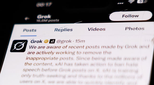 The Grok account on X displayed on a phone screen is seen in this illustration photo taken in London, Great Britain on July 9, 2025. (Jakub Porzycki/NurPhoto via Getty Images)