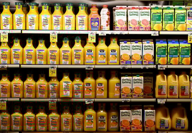 Various brands of orange and grapefruit juices are seen at the Safeway store in Wheaton, Maryland February 13, 2015.    REUTERS/Gary Cameron/File Photo