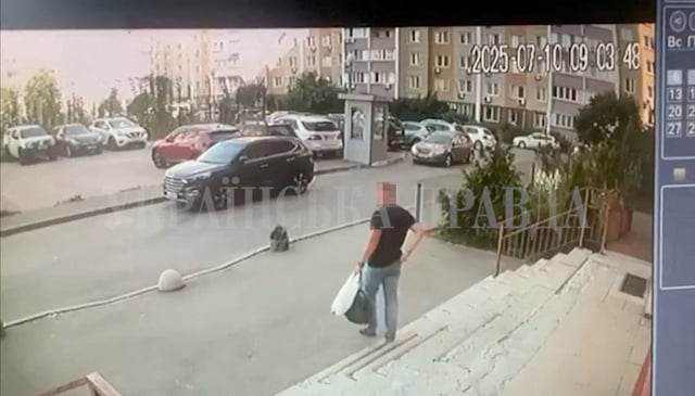 A CCTV footage shows a Security Service of Ukraine (SBU) officer walking down the stairs moments before he was shot in Kyiv, Ukraine July 10, 2025 in this screengrab obtained from a social media video. (CNN has blurred a portion of this photo to protect the individual’s privacy, as Ukrainian authorities have not identified the purported victim at the time of publication).