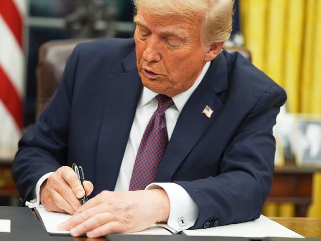 FILE - President Donald Trump signs an executive order on birthright citizenship in the Oval Office of the White House in Washington, Jan. 20, 2025. (AP Photo/Evan Vucci, File)