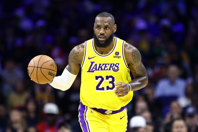LeBron James #23 of the Los Angeles Lakers dribbles during the third quarter against the Philadelphia 76ers at the Wells Fargo Center on November 27, 2023 in Philadelphia, Pennsylvania.