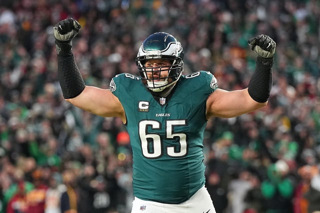 Lane Johnson #65 of the Philadelphia Eagles reacts after a touchdown run against the Washington Commanders during the third quarter in the NFC Championship Game at Lincoln Financial Field on January 26, 2025 in Philadelphia, Pennsylvania.