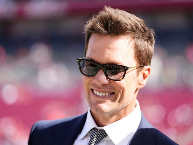 FILE - Former NFL quarterback Tom Brady makes an appearance on the field before an NFL football game between the New Orleans Saints and the Tampa Bay Buccaneers, Sunday, Jan 5, 2025, in Tampa, Fla. (AP Photo/Peter Joneleit, File