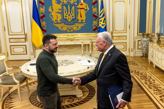 U.S. Special Envoy to Ukraine and Russia Keith Kellogg shakes hands with Ukrainian President Volodymyr Zelenskiy, amid Russia's attack on Ukraine, in Kyiv, Ukraine, February 20, 2025. REUTERS/Thomas Peter/File Photo