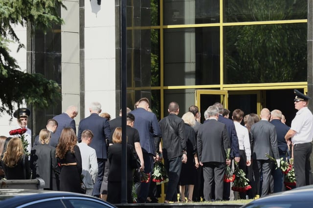 People line up to bid farewell to Roman Starovoit, the former transport minister who died in apparent suicide after his dismissal, at the morgue of the Central Clinical Hospital in Moscow, Russia, Thursday, July 10, 2025. (AP Photo)