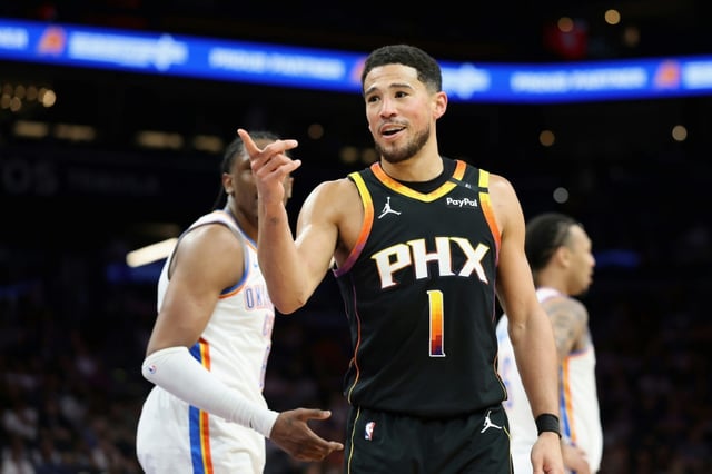 Devin Booker of the Phoenix Suns reacts during an NBA game in April 2025