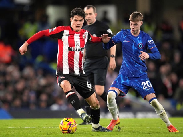 FILE - Brentford's Christian Norgaard, left, defends the ball from Chelsea's Cole Palmer during the English Premier League soccer match between Chelsea and Brentford at Stamford Bridge in London, Dec. 15, 2024. (AP Photo/Kin Cheung, File)
