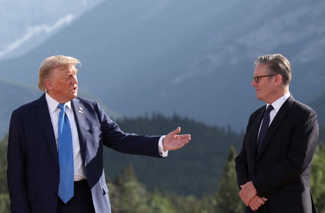 U.S. President Donald Trump and British Prime Minister Keir Starmer attend a family photo session during the G7 Summit, in Kananaskis, Alberta, Canada, June 16, 2025. REUTERS/Suzanne Plunkett/Pool/File Photo