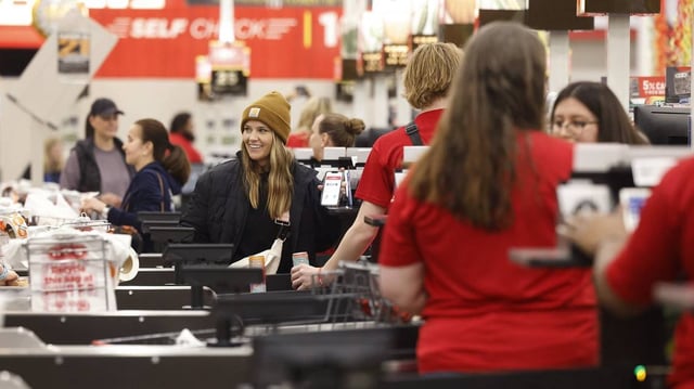 Customers check out at the registers of the Fort Worth Alliance H-E-B on Wednesday, April 10, 2024. Hundreds lined up for the opening of the store.