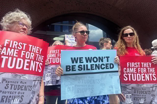 People show their support for a lawsuit challenging the Trump administration's policy of targeting students for deportation who took part in pro-Palestinian demonstrations on Monday, July 7, 2025, at the federal courthouse in Boston. (AP Photo/Michael Casey)