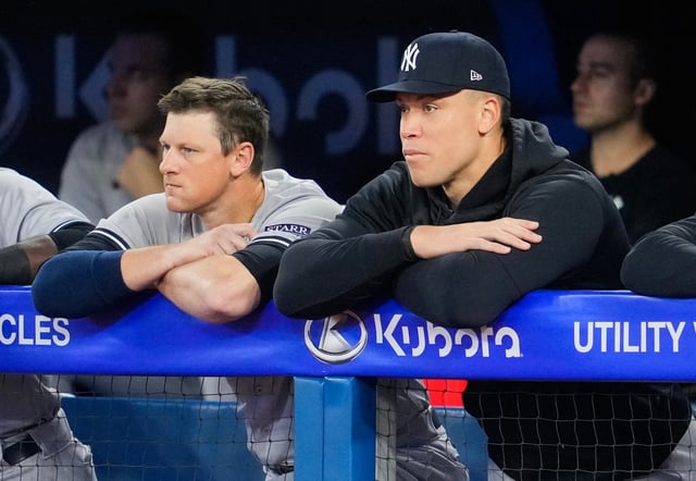 TORONTO, ON - SEPTEMBER 26: Aaron Judge #99 of the New York Yankees watches on from the dugout while not in the lineup with DJ LeMahieu #26 as their team plays the Toronto Blue Jays in their MLB game at the Rogers Centre on September 26, 2023 in Toronto, Ontario, Canada. (Photo by Mark Blinch/Getty Images)