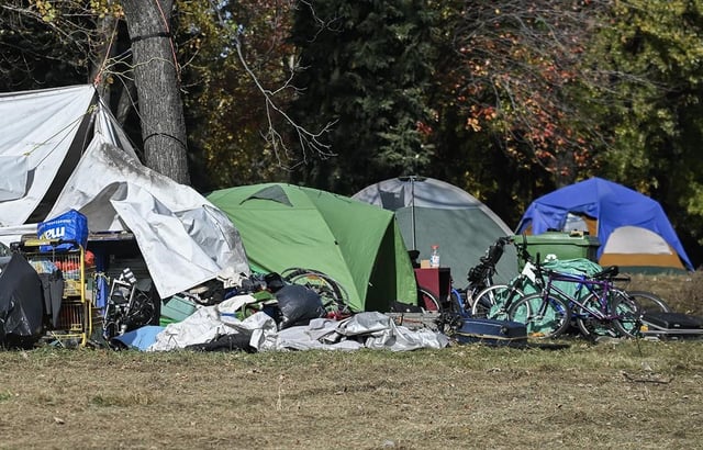 A pair of independent Montreal city councillors have tabled a motion to get the city to declare a state of emergency on homelessness next week. A homeless encampment is shown in the east end of Montreal, Friday, Oct. 25, 2024. THE CANADIAN PRESS/Graham Hughes.