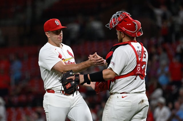 ST LOUIS, MISSOURI - JULY 8: Ryan Helsley #56 and Pedro Pagés #43 of the St. Louis Cardinals celebrates after beating the Washington Nationals at Busch Stadium on July 8, 2025 in St Louis, Missouri.