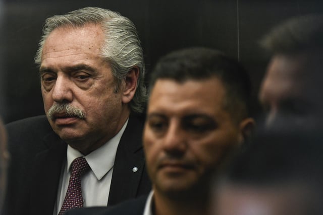 FILE - Former President Alberto Fernandez leaves federal court after testifying in a gender violence case brought against him by his ex-partner Fabiola Yanez, in Buenos Aires, Argentina, Feb. 4, 2025. (AP Photo/Gustavo Garello, File)