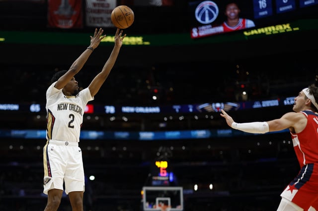 Jan 5, 2025; Washington, District of Columbia, USA; New Orleans Pelicans forward Herbert Jones (2) shoots the ball over Washington Wizards forward Corey Kispert (24) in the third quarter at Capital One Arena. Mandatory Credit: Geoff Burke-Imagn Images/File Photo