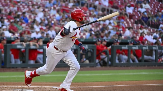 Jul 10, 2025; St. Louis, Missouri, USA;  St. Louis Cardinals right fielder Alec Burleson (41) hits a one run single against the Washington Nationals during the third inning at Busch Stadium. Mandatory Credit: Jeff Curry-Imagn Images