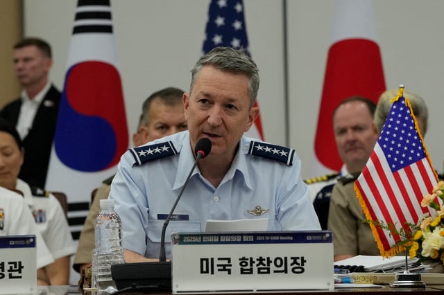 John Daniel Caine, chairman of the U.S. Joint Chiefs of Staff, speaks during a Trilateral Chiefs of Defense meeting with General Yoshihide Yoshida, chief of Staff, Joint Staff of Japan, and Admiral Kim Myung-soo, chairman of the South Korean Joint Chiefs of Staff, at the Defense Ministry in Seoul, South Korea, Friday, July 11, 2025.     Ahn Young-joon/Pool via REUTERS