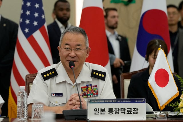 General Yoshihide Yoshida, Chief of Staff, Joint Staff of Japan, speaks during a Trilateral Chiefs of Defense meeting with Admiral Kim Myung-soo, chairman of the South Korean Joint Chiefs of Staff, and John Daniel Caine, chairman of the U.S. Joint Chiefs of Staff, at the Defense Ministry in Seoul, South Korea, Friday, July 11, 2025.     Ahn Young-joon/Pool via REUTERS