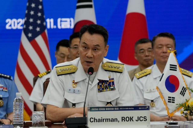 Admiral Kim Myung-soo, chairman of the South Korean Joint Chiefs of Staff, speaks during a Trilateral Chiefs of Defense meeting with General Yoshihide Yoshida, Chief of Staff, Joint Staff of Japan and John Daniel Caine, chairman of the U.S. Joint Chiefs of Staff, at the Defense Ministry in Seoul, South Korea, Friday, July 11, 2025.     Ahn Young-joon/Pool via REUTERS