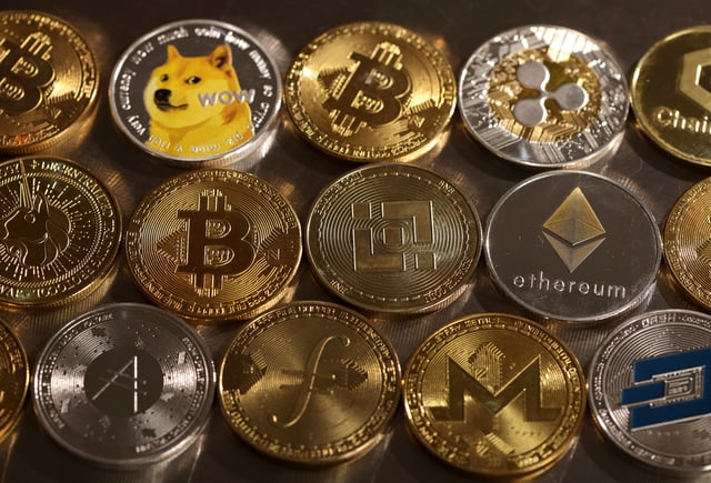 Representations of cryptocurrencies are seen in this illustration, August 10, 2022. REUTERS/Dado Ruvic/Illustration