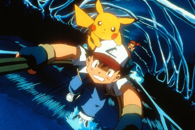 Ash, Pikachu and Misty (background) in 4Kids Entertainment&#39;s animated adventure &#34;Pokémon 3,&#34; distributed by Warner Bros. Pictures, on April 17, 2001.
