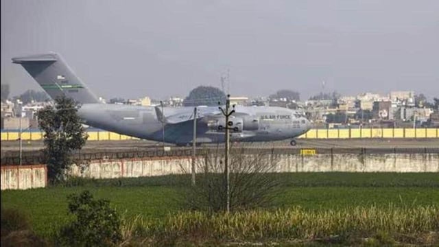 A US Air Force C-17 Globemaster III aircraft carrying deportees lands at Sri Guru Ram Dass Jee International Airport in Amritsar on February 5. (File photo)