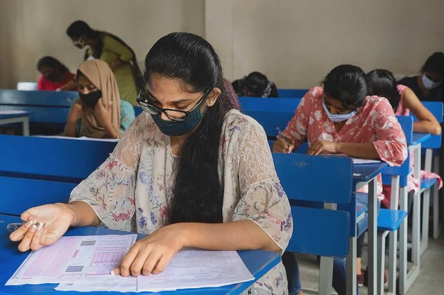students writing an exam. Image used for representation 