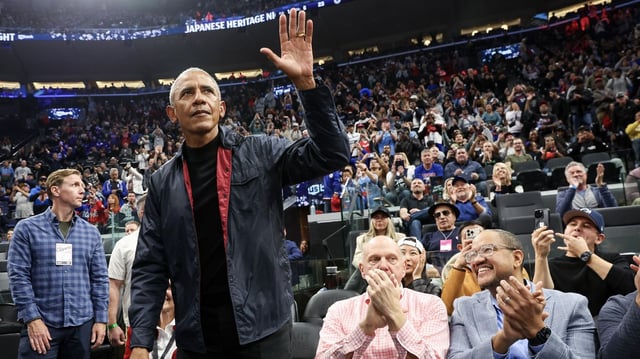 Former President Obama waves to fans. Photo: Meg Oliphant/Getty Images
