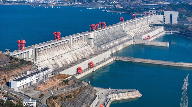 Water gushes out from the Three Gorges Dam through nine of its flood discharge gates to spare more capacity for incoming floods from upper reaches of the Yangtze River