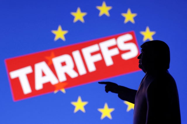A 3D-printed miniature model depicting U.S. President Donald Trump depicting European Union flag and word "Tariffs" in this illustration taken,  April 17, 2025. REUTERS/Dado Ruvic/Illustration/File Photo